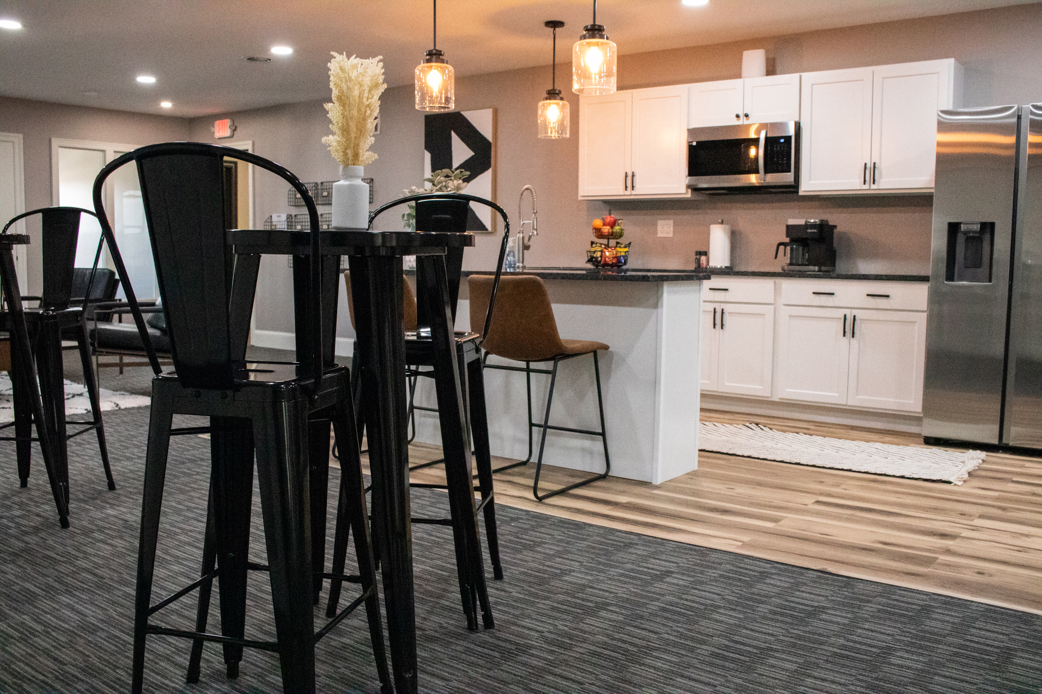 Overview of the common area and kitchen in Suite 203 at Akron Spaces