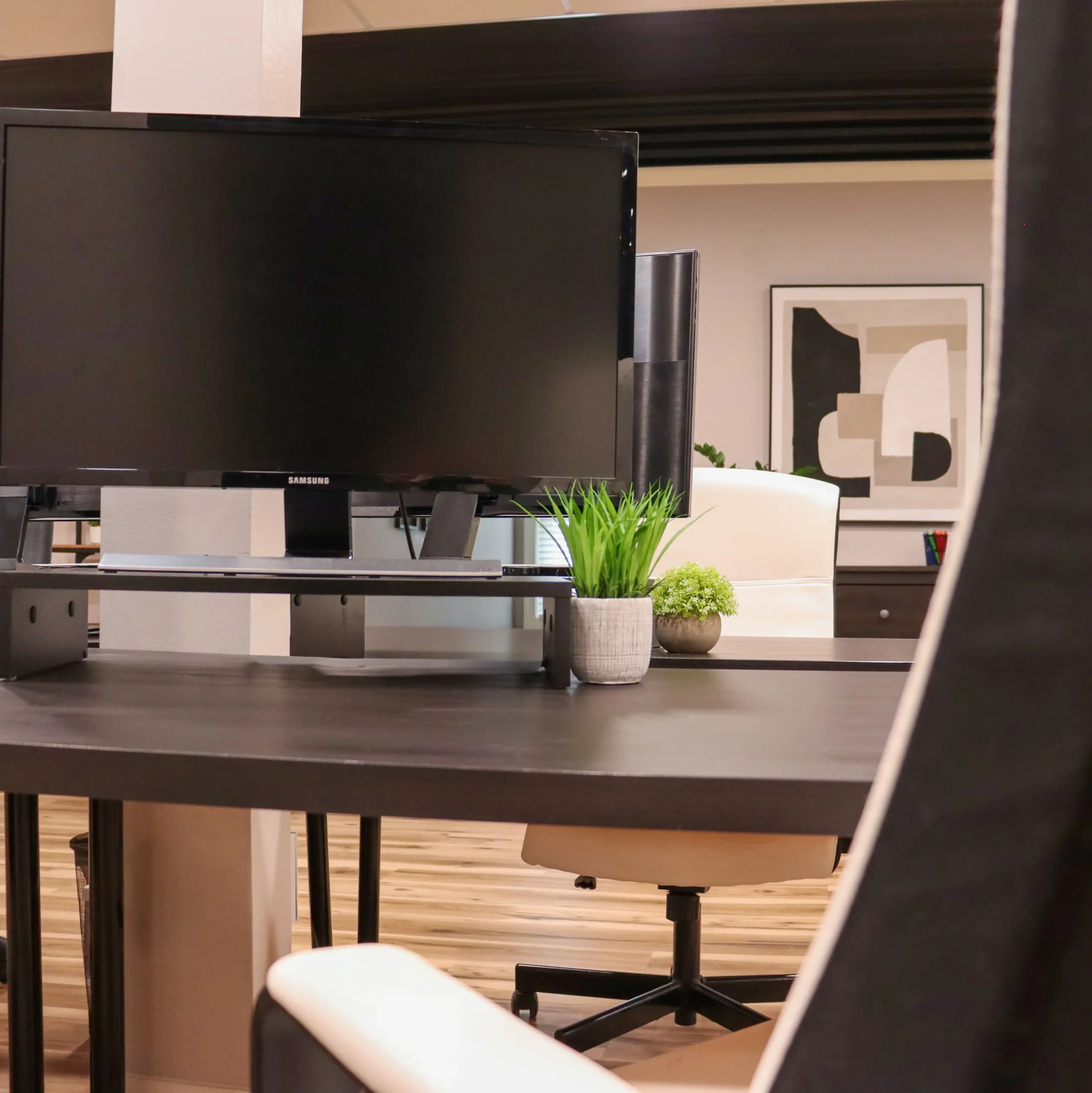 Coworking desk setup with a secondary monitor